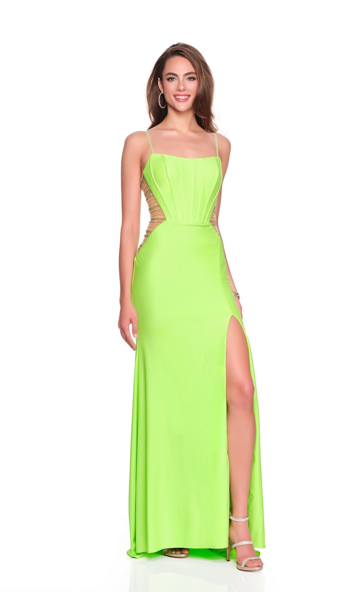 A woman models the Long Prom Dress: Dave and Johnny 12710, featuring neon green fabric, spaghetti straps, beige side panels, and a thigh-high slit, posing against a white background for a chic modern look.